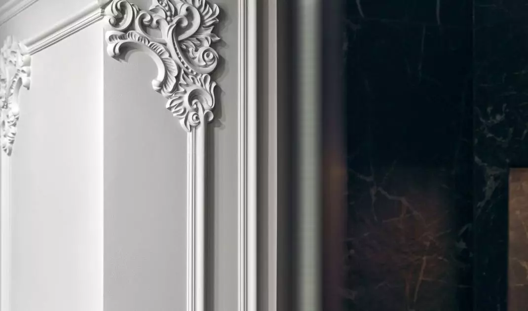 Stucco appears throughout the home