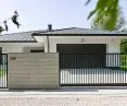 Front fence made of prefabricated blocks with 12x2 profile infill
