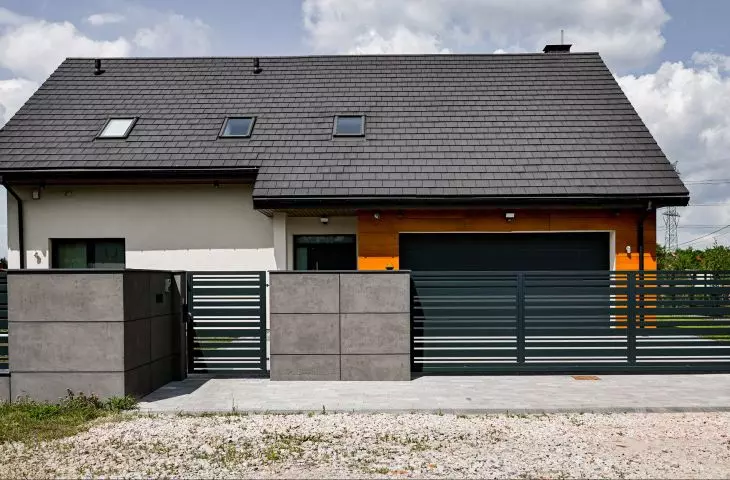 Front fence on architectural concrete block wall