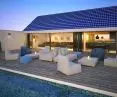 Cohesive design of the entire building with the eTile Classic roof