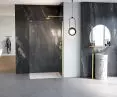 W ofercie New Trendy są wyjątkowe kabiny typu walk-in, w najmodniejszych kolorach. Na zdjęciu zaprezentowano kabinę Nesta w kolorze Gold Brushed, z popularnym ryflowanym szkłem Visiosun, dostępnym w ofercie Na Wymiar.