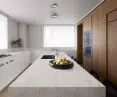 Kitchen island and countertop in Corian® Sand Storm