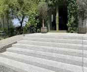 Entrance to the restaurant with granite block steps