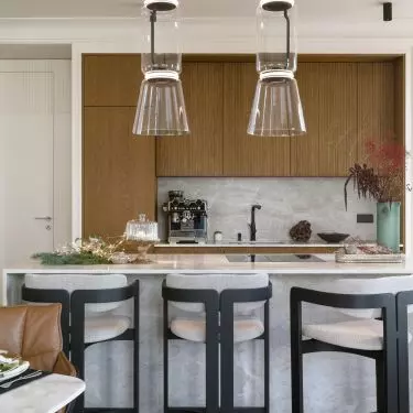The kitchen cabinet was made of wood and stone