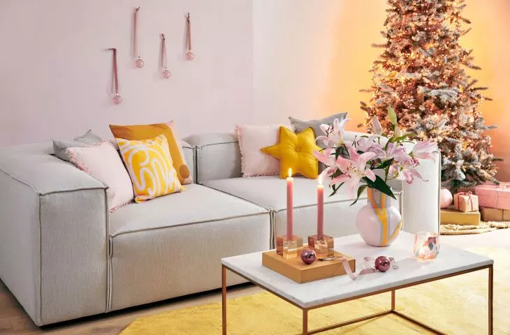 Don't want to hang baubles on your Christmas tree? Nail them to the wall!