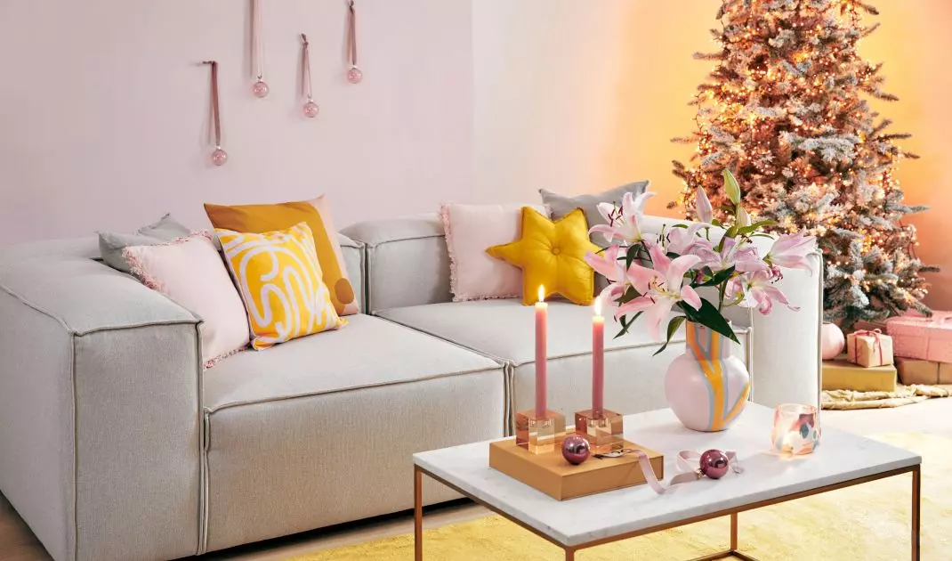 Don't want to hang baubles on your Christmas tree? Nail them to the wall!