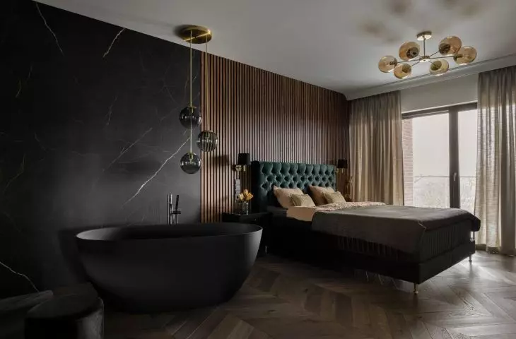 The bedroom has a freestanding bathtub