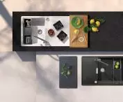 Cristadur® TIA D100 LS sink in white (Polaris) and black (Magma) with accessories like black plastic board (29184), wooden board (629044), frame (629727), functional inserts in black (629728)