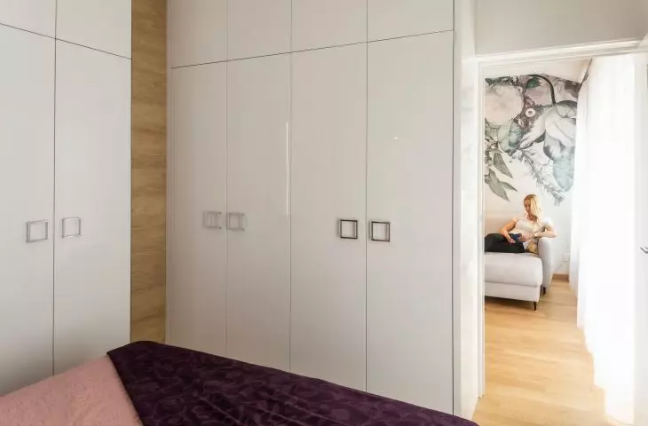 The bedroom enclosure is L-shaped