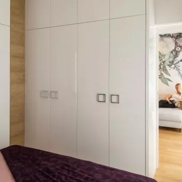 The bedroom enclosure is L-shaped