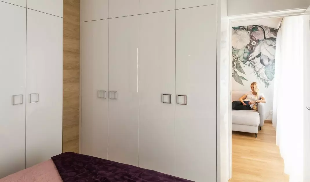 The bedroom enclosure is L-shaped