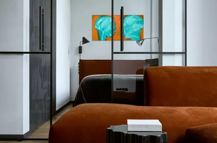 The industrial color scheme is broken by brick-red
