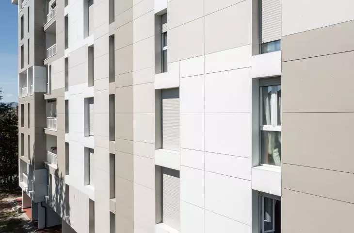 Hardie Panel application example, facade renovation in a multi-family building, Reggio Emilia, Italy
