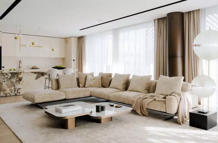 In the living room there is a hand-woven silk carpet