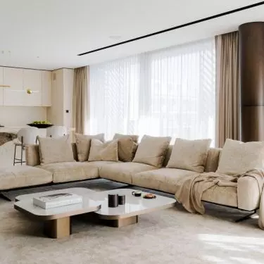 In the living room there is a hand-woven silk carpet