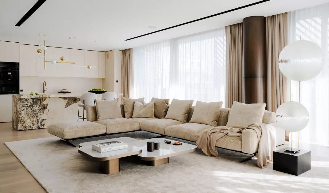 In the living room there is a hand-woven silk carpet