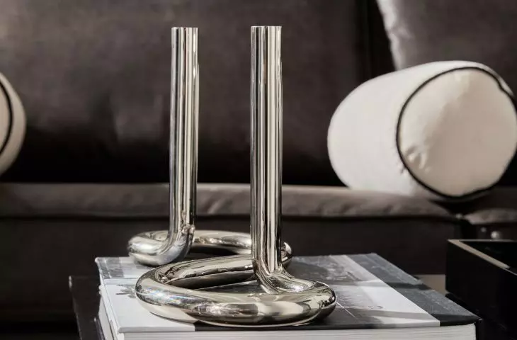 Metal accessories are a key element of Sleek Industrial style arrangements