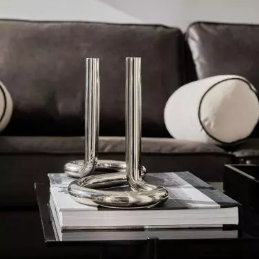 Metal accessories are a key element of Sleek Industrial style arrangements