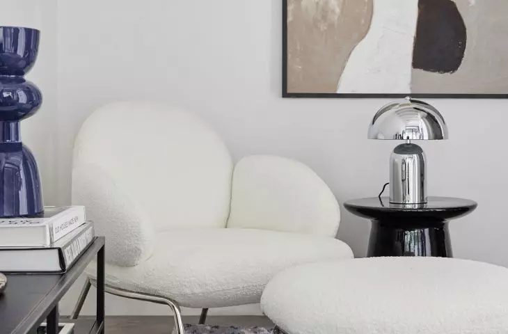 Warm textiles juxtapose with raw materials such as metal