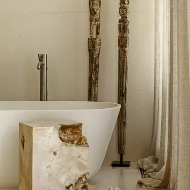 Next to the tub is the original table