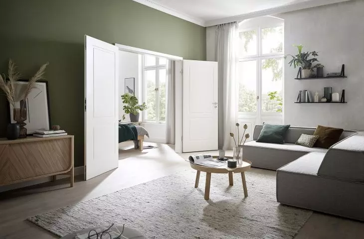 ClassicLine wooden door with rebate, lacquered in RAL 9016, handle Linea matt stainless steel