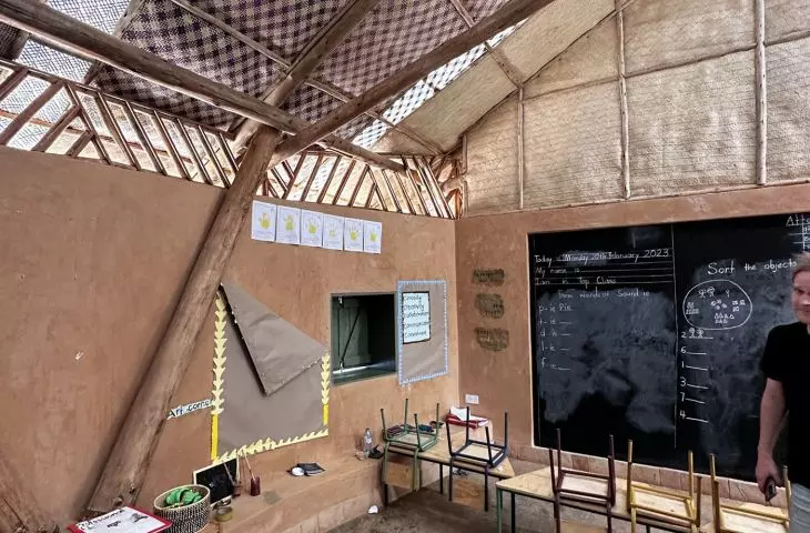 all classrooms are naturally lit and naturally ventilated; note the expansion joint between the walls and the roof 
