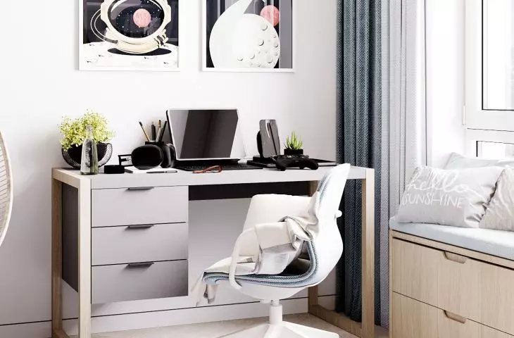 Space-inspired graphics hang above the desk