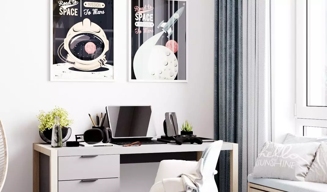 Space-inspired graphics hang above the desk