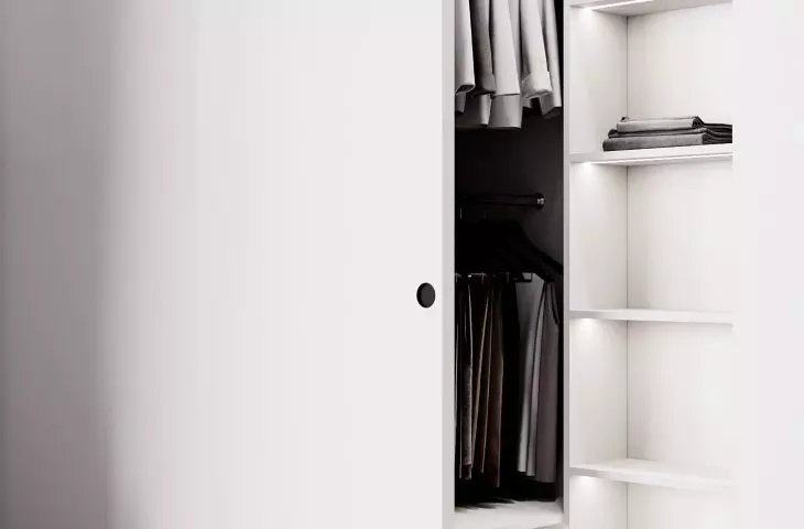 The closet is equipped with solutions for easy storage of clothes