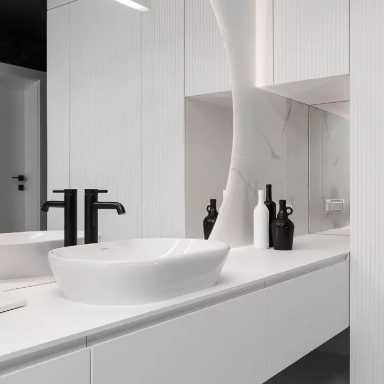The bathroom is located on the first floor of the terraced house