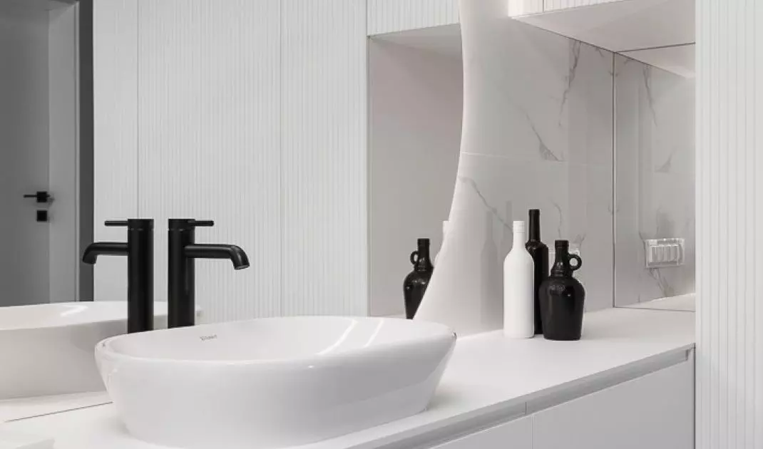 The bathroom is located on the first floor of the terraced house