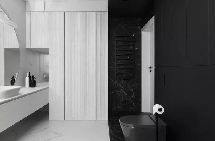 In the dark part of the bathroom, even the ceiling was covered with black