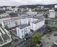 The complex of the District Court in Gdynia before the expansion, behind Building B with the mural can be seen a two-story building covered with a sloping roof, which will be replaced by a new development
