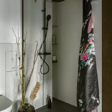 The bathroom is located on the lower floor 