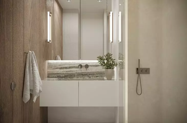 The wall above the sink was decorated with stone
