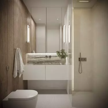 The wall above the sink was decorated with stone