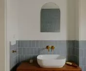 A special cabinet has been designed under the washbasin
