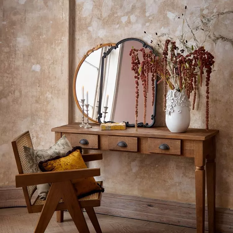 Decorative candle holders and decorative mirrors will add charm to the arrangement