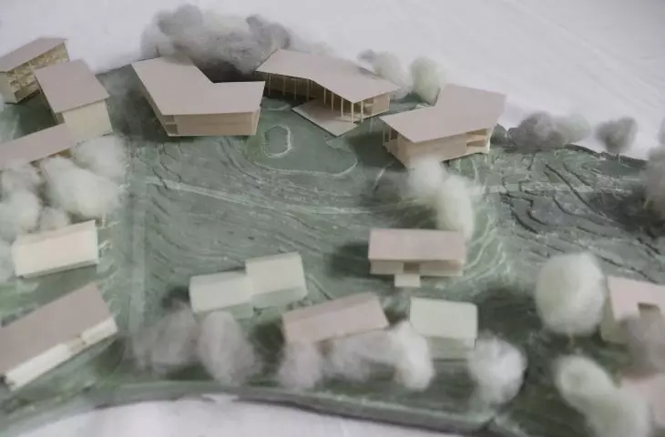 The buildings are spread out on the periphery of the plot