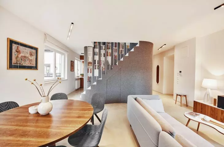 A centrally located structure divides the space