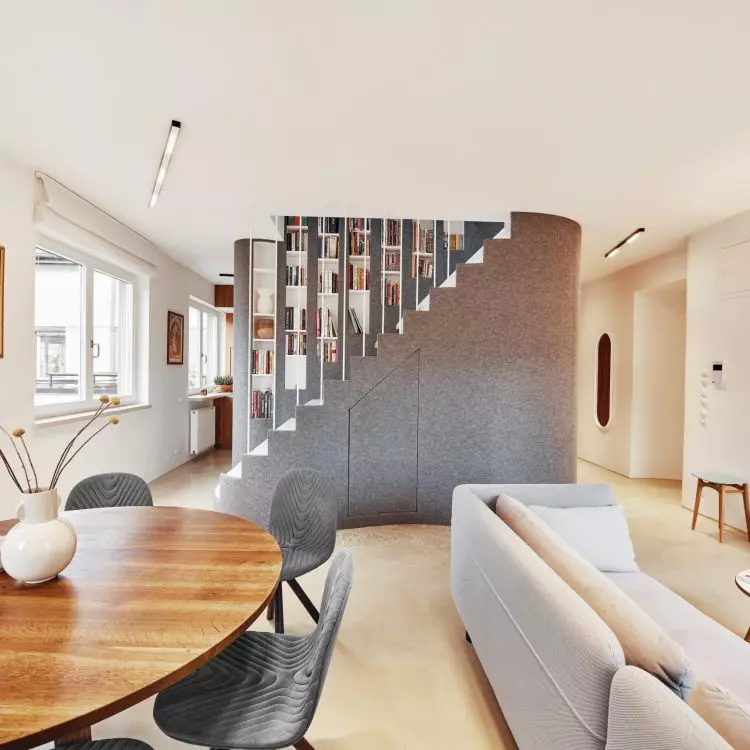 A centrally located structure divides the space