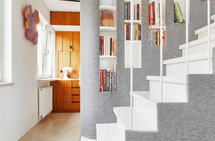 The structure includes a staircase leading to the top