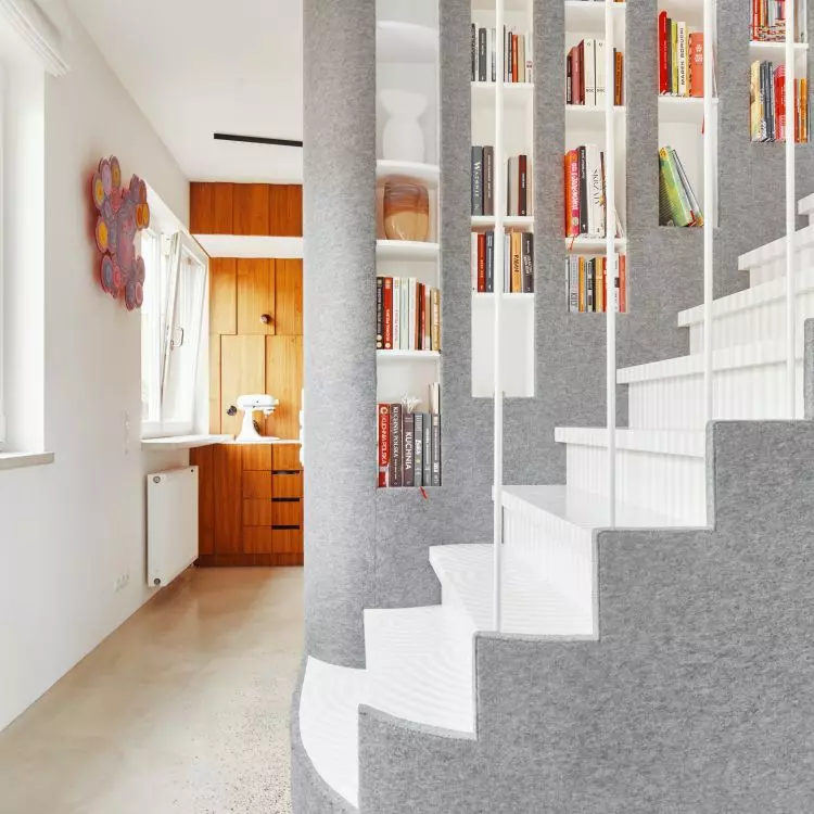 The structure includes a staircase leading to the top
