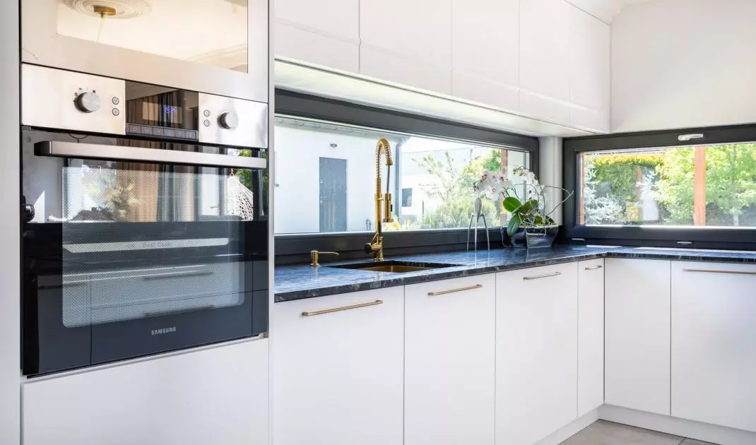 Kitchen cabinets have white fronts