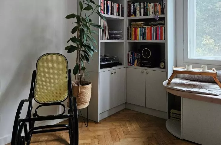 In the reading corner there is a rocking chair