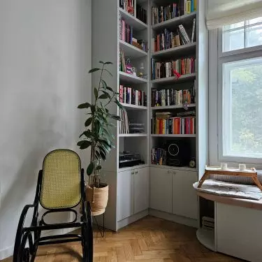 In the reading corner there is a rocking chair