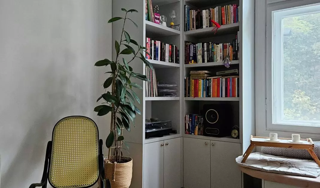 In the reading corner there is a rocking chair