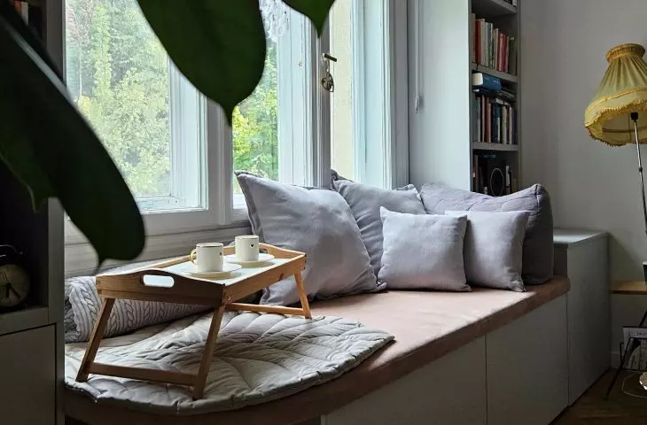 The wall with the window has been allocated for a bookcase