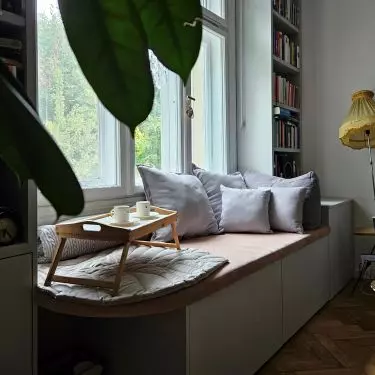 The wall with the window has been allocated for a bookcase