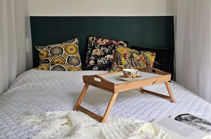 Bedroom arrangement combines subdued base with vibrant accents